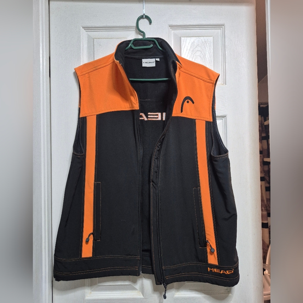 HEAD vest Men's Size Large. Like new,worn a couple times.Inner and outer pockets